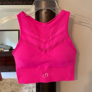 Pink seamless Curves N Combatboots sports bra